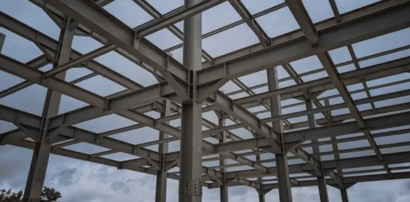Architectural standing seam roofing for Lodha Mumbai: Premium metal building envelope featuring a minimalist aesthetic and hidden fastener technology by Rishonn & Reyansh.